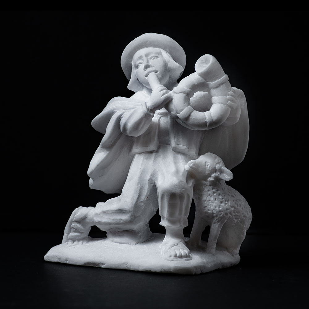 NIÑO CAMPESINO MÚSICO
